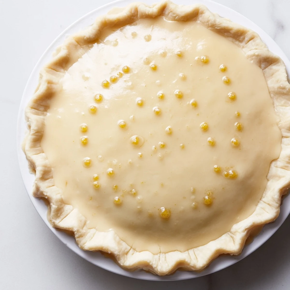 This delicious Water Pie is served chilled, a creamy dessert perfect for a light, refreshing treat.