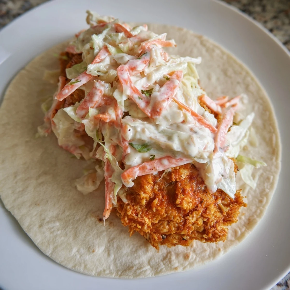 Close-up of crispy Buffalo Chicken Smash Burger Tacos, bursting with flavor, ready to be devoured.
