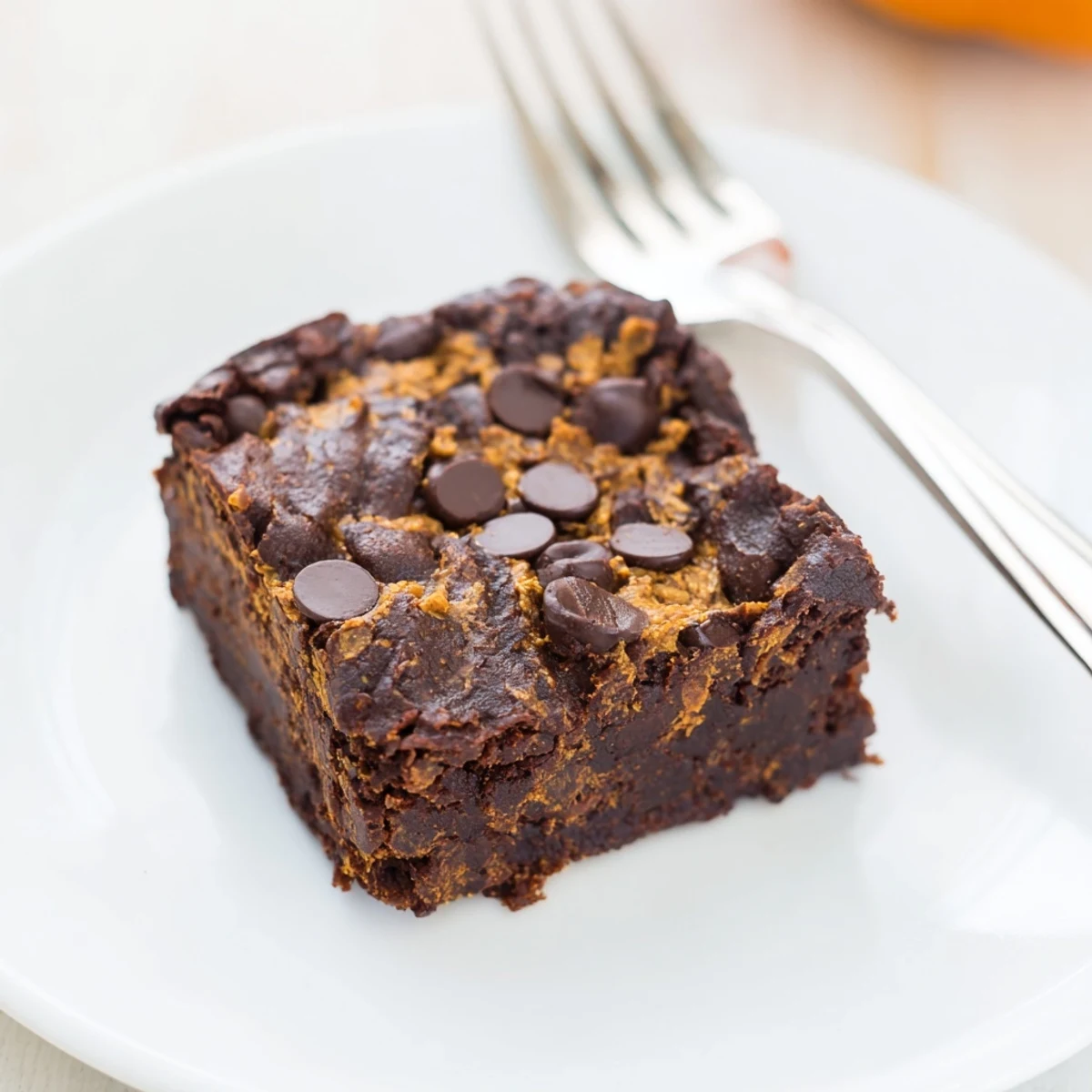 Warm, chocolatey scent; these soft Pumpkin Workout Brownies are ready to be cut and enjoyed.