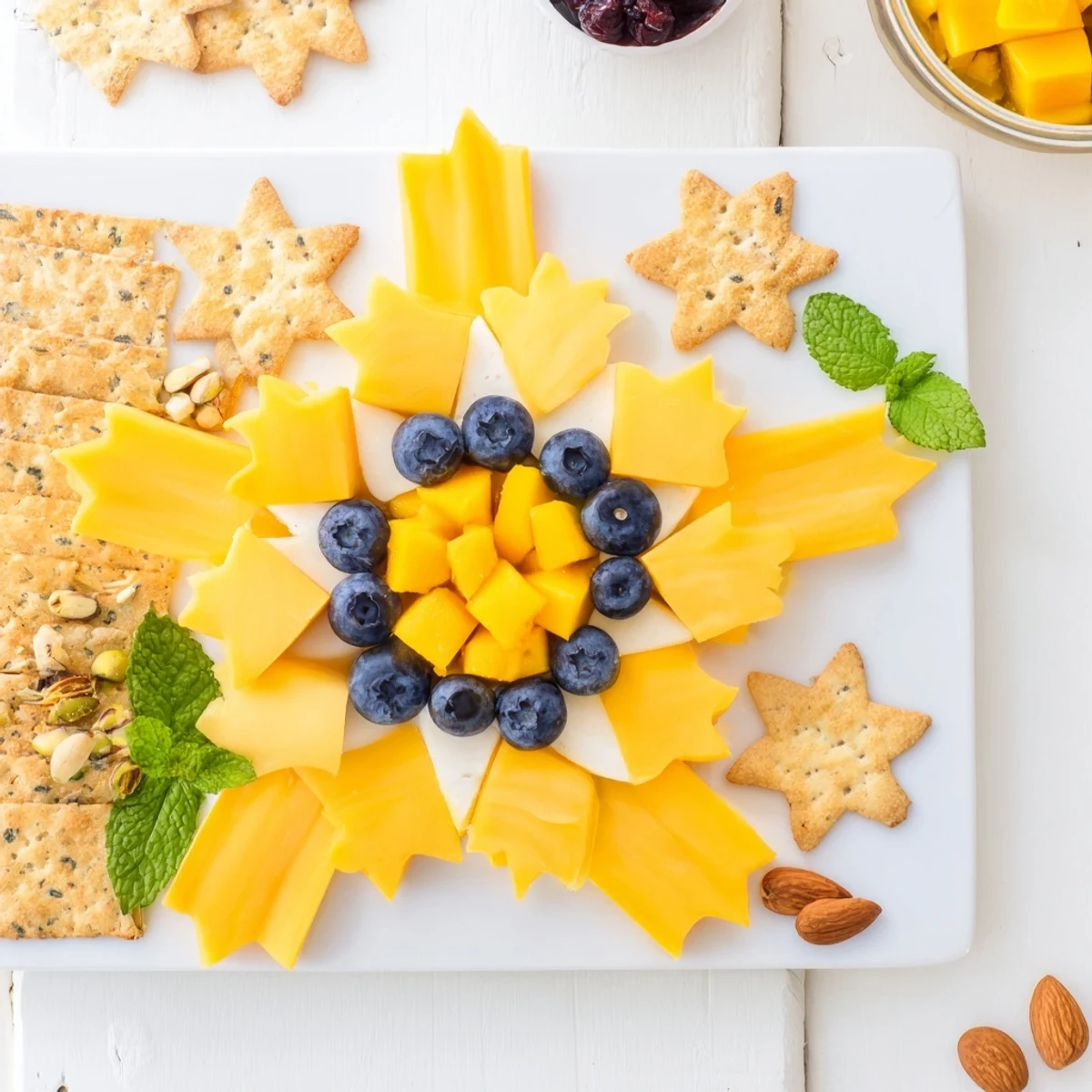 Shooting Star Snack Board with vibrant fruits, cheeses, and crackers; perfect party appetizer.