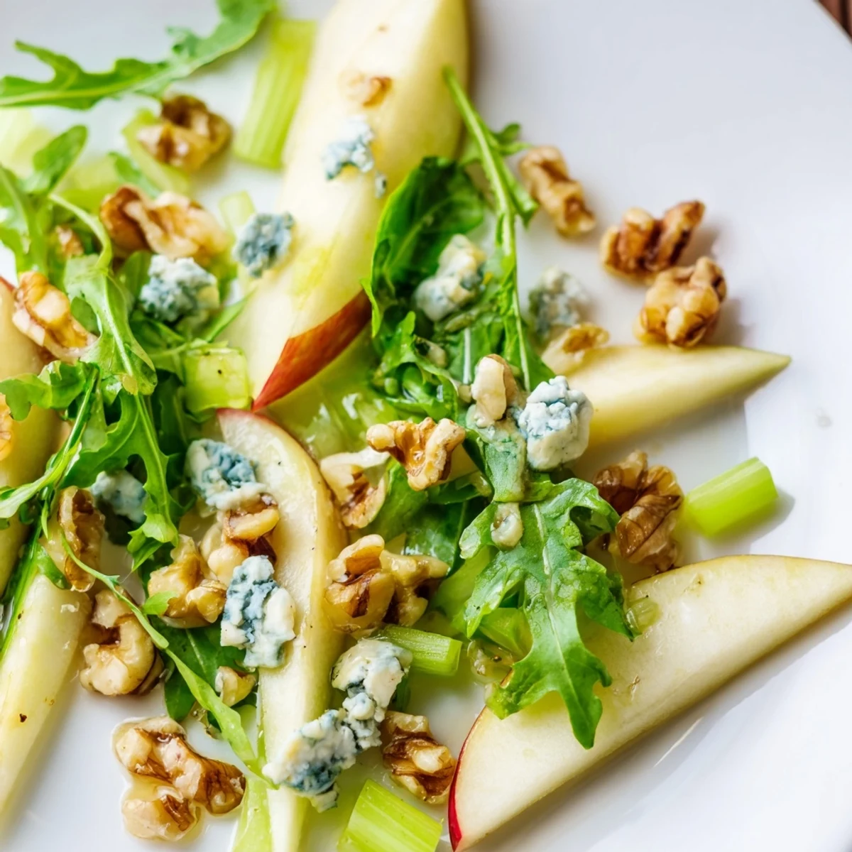 Sliced apples, walnuts, and greens tossed in tangy vinaigrette, this Apple and Walnut Salad offers a crunchy, refreshing winter side.  