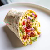 These hearty Easy Festive Breakfast Burrito Wraps feature vibrant veggies, perfect for a satisfying breakfast.