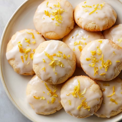 A plate of cookies with orange zest.