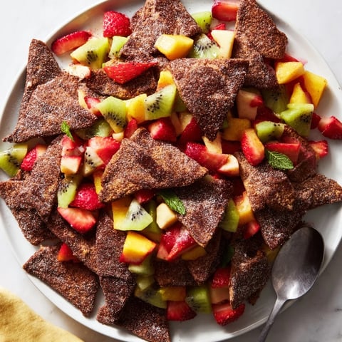 Crispy chocolate tortilla chips served with colorful, refreshing fruit salsa for dessert.  