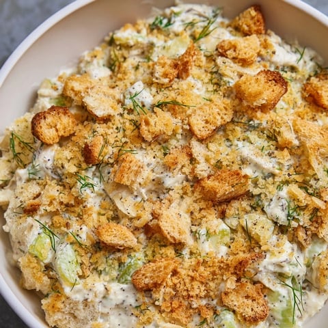 Creamy Fried Pickle Dip topped with golden panko and fresh green onions, ready to be enjoyed.