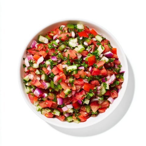 Vibrant Pickle De Gallo Salsa with red tomatoes, cilantro, and lime, ready to scoop with chips.