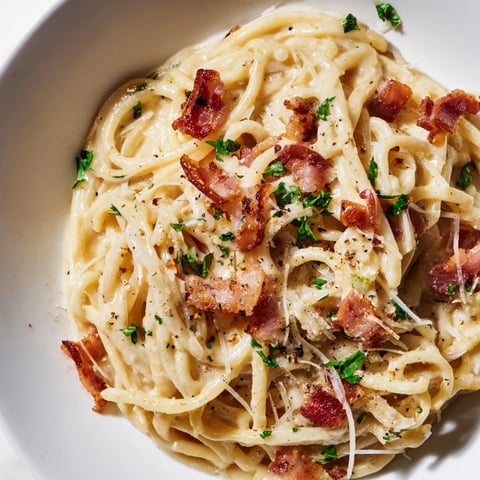 Instant Pot Carbonara Ramen Hack, a quick and easy fusion of creamy noodles with crispy bacon.