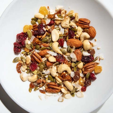 Golden Nutty Nosh Squirrel Snack Mix, a blend of roasted nuts and fruits, offers a delightful crunch.