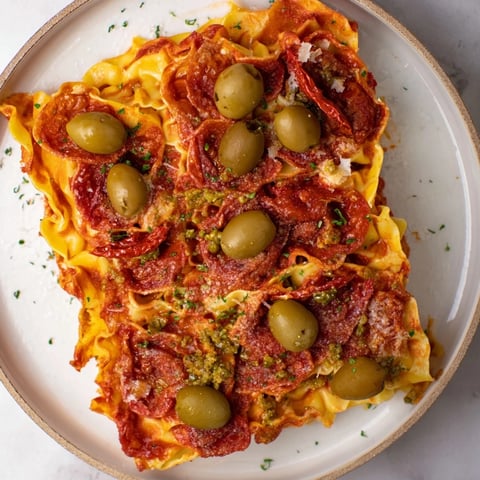 Golden Olive and Sundried Tomato Star Garland, a savory, flaky appetizer with vibrant toppings ready.