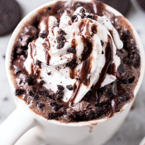 Warm, gooey Oreo Mug Cake, perfect for a quick and satisfying chocolate dessert, fresh from the microwave.
