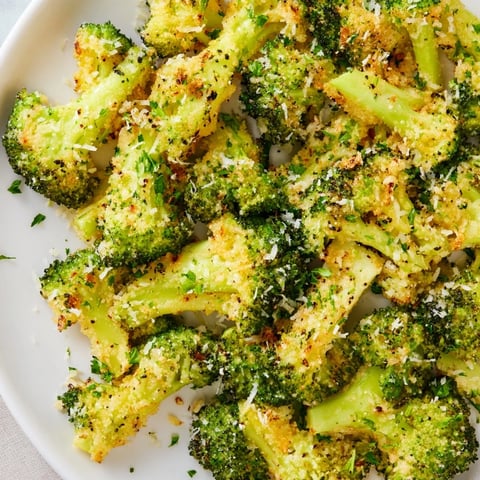 Golden brown Garlic Parmesan Roasted Broccoli, ready to serve as a flavorful and easy side.