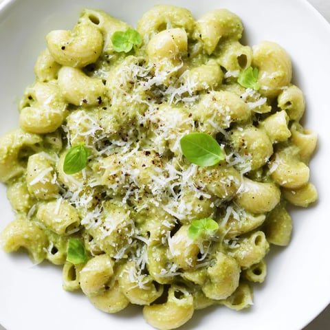 Creamy Avocado Pesto Mac, a vivid photo showing the delicious pesto coating tender pasta.
