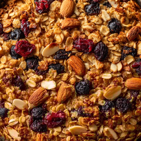 A close up of a baked oatmeal cake.