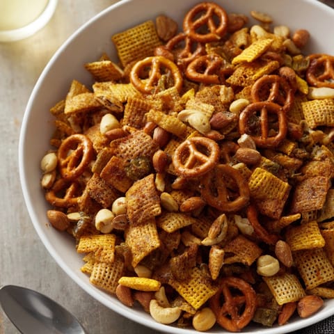Homemade Spicy Jalapeño Holiday Snack Mix: A crunchy, savory, jalapeño-infused Christmas treat.