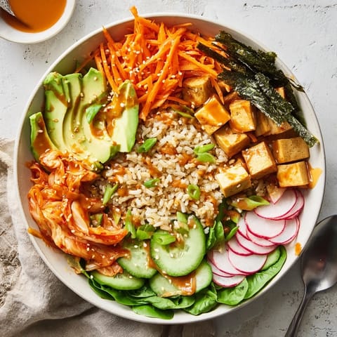 Delicious fermented vegetable bowl featuring hearty grains and a zesty dressing.  