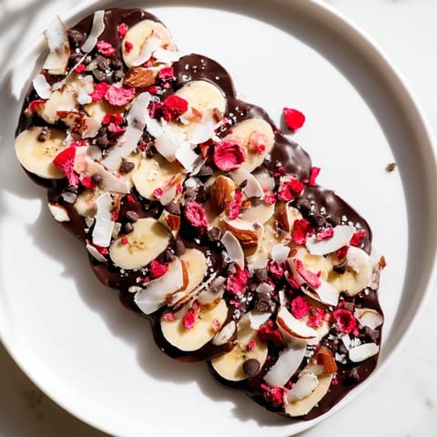 Frozen and refreshing, the Chocolate Banana Bark is studded with almonds and coconut flakes.