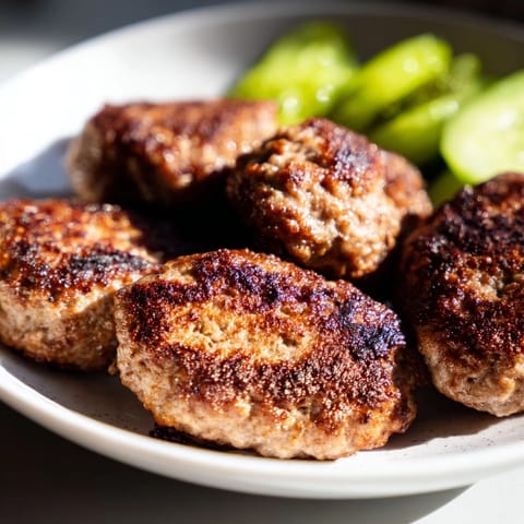 Imagine juicy Danish frikadeller meatballs, cooked until golden, a classic Danish comfort food.