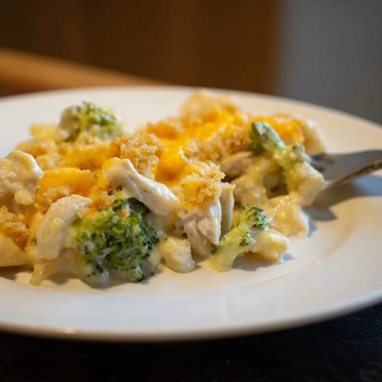 Comforting Chicken & Broccoli Cheddar Bake, bursting with flavor and cheesy goodness in every bite.