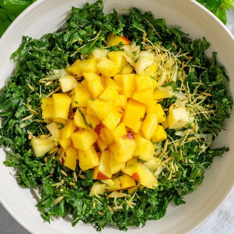 Fresh The Sunlit Glade salad showcases bright mango, pineapple, and greens, sprinkled with toasted seeds.