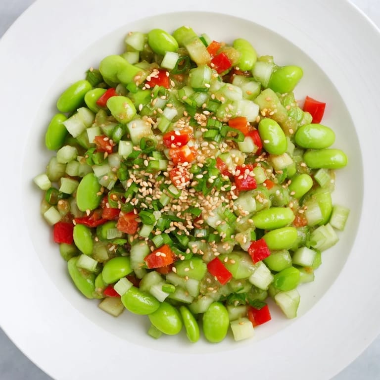 Chilled Edamame Salad with crisp cucumber; imagine the sesame dressing glistening on each bite.