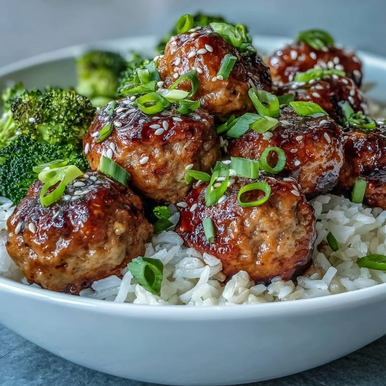 Savory Honey Garlic Turkey Meatballs served with blanched broccoli and steamed rice for a wholesome dinner.